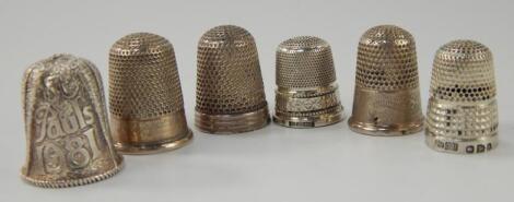 Six silver thimbles