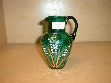 A 'Mary Gregory' green glass jug