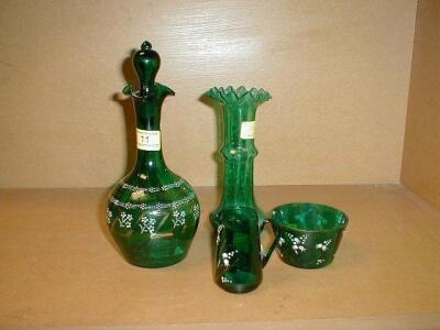 A green glass flask and stopper