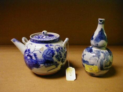 A Chinese 19thC export blue and white double gourd vase