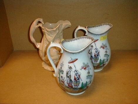 A pair of ironstone baluster jugs