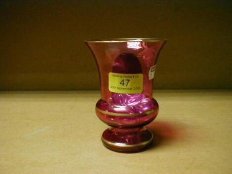 A 'Mary Gregory' cranberry glass campana shaped vase