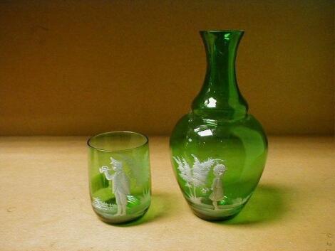 A 'Mary Gregory' green glass water carafe