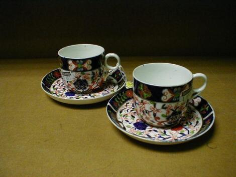 A pair of Derby coffee cups and saucers