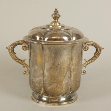 A George V silver caudle cup and cover