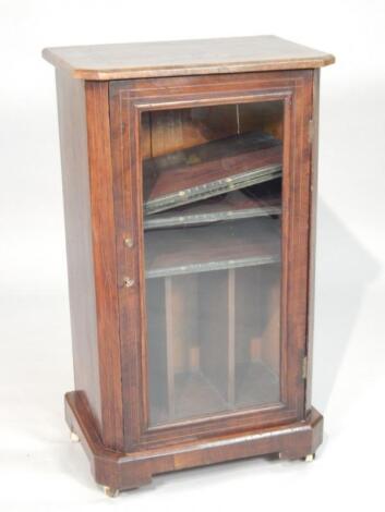 A Victorian walnut music cabinet