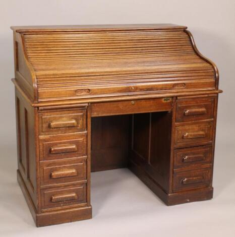 A 1930's oak writing desk