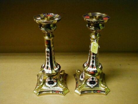 A pair of Royal Crown Derby table candlesticks