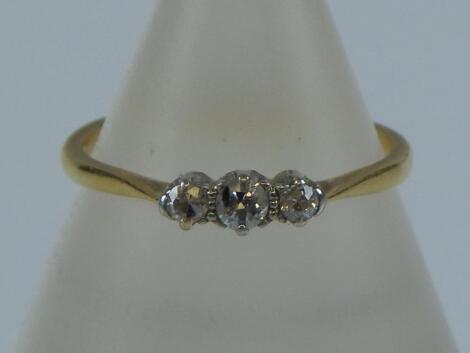 A three stone diamond ring