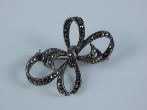 A Continental marcasite bow brooch