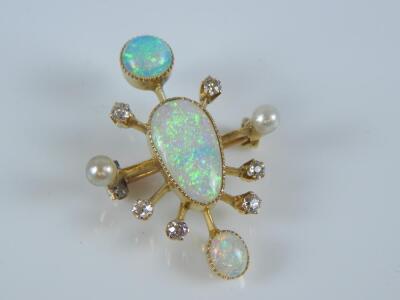 An opal and diamond abstract brooch