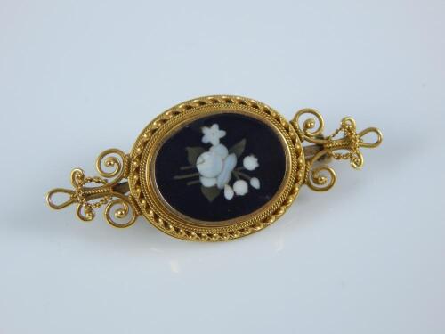 A Victorian/Edwardian micro mosaic brooch