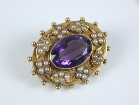 A Victorian amethyst and seed pearl set brooch