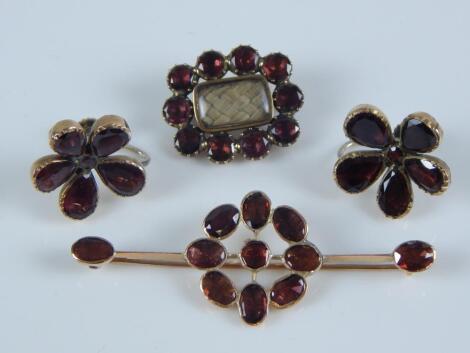 A garnet set memorial brooch