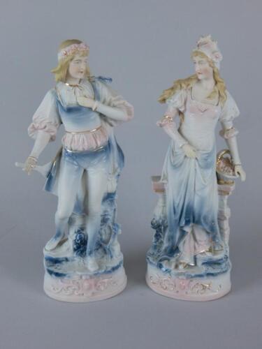 A pair of German bisque porcelain figures