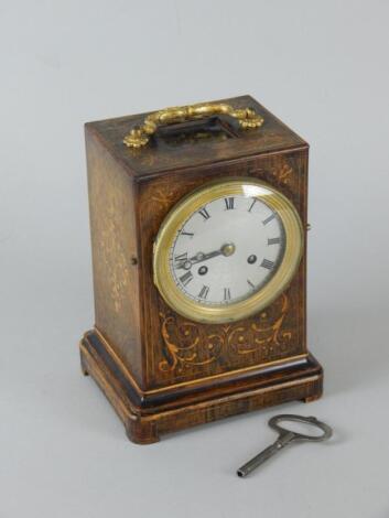 A 19thC rosewood and boxwood inlaid library type clock