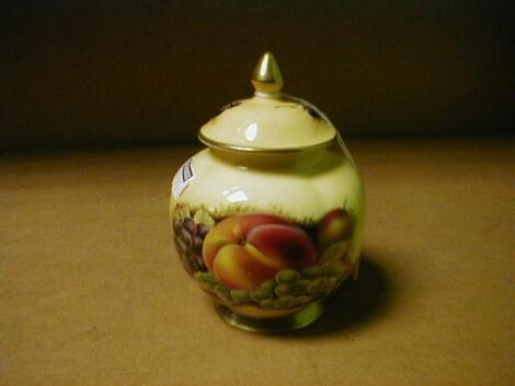 An Aynsley porcelain 'Orchard Gold' circular pot and cover