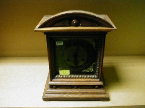 An early 20thC German oak cased bracket clock