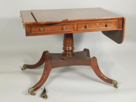 A George IV plum pudding mahogany sofa table