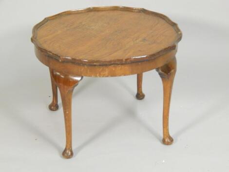 A 1920's walnut occasional table