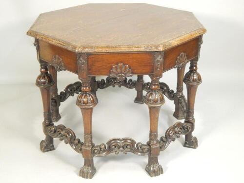 An early 20thC walnut library table