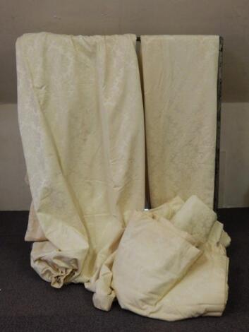 Two pairs of cream damask style lined and interlined curtains