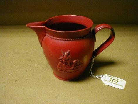 A 19th C redware ovoid milk jug