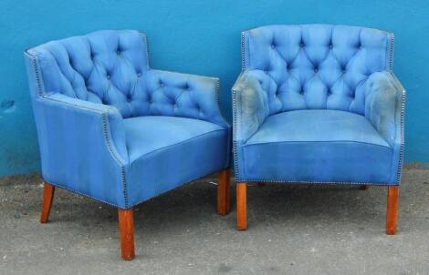 A pair of mid 20thC club type chairs