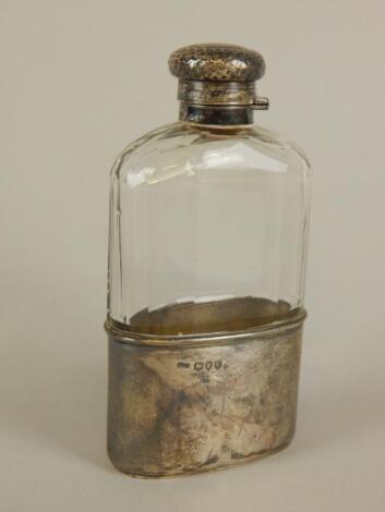 An Edwardian silver and cut glass hip flask