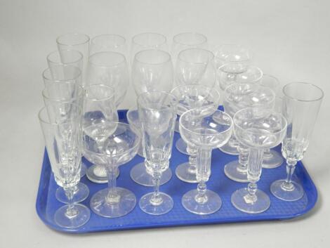 A large quantity of drinking glasses