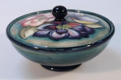 A mid-20thC Moorcroft Clematis pattern powder bowl and cover