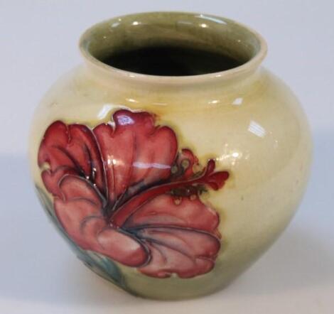 A mid-20thC Moorcroft Hibiscus pattern vase