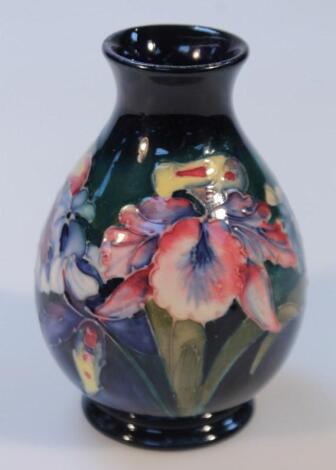 A 20thC Moorcroft Orchid pattern vase