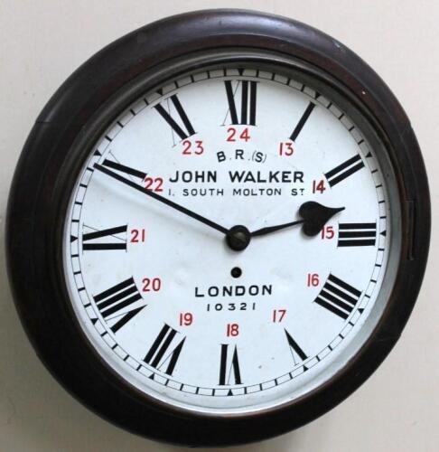 A 20thC BRS oak case railway clock