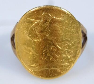 A 1958 gold sovereign curved ring