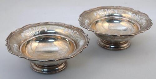 A pair of George VI Harrods silver bon bon dishes