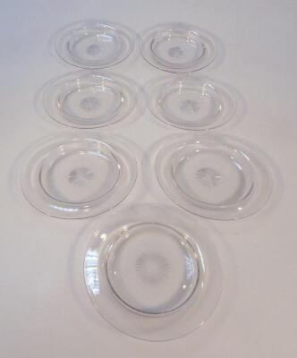 A set of seven plain cut glass and etched ice bowls