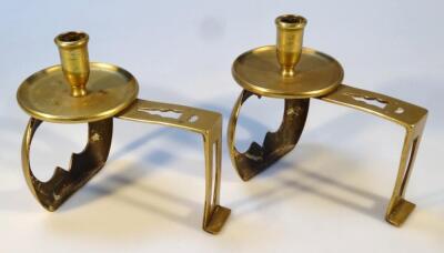 A pair of brass fire dog candlesticks - 2