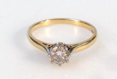 A ladies diamond solitaire ring