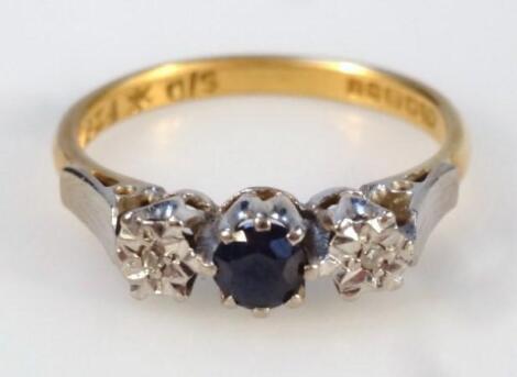 A sapphire and diamond three stone dress ring