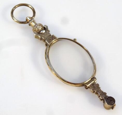 An early 20thC spring loaded pince-nez