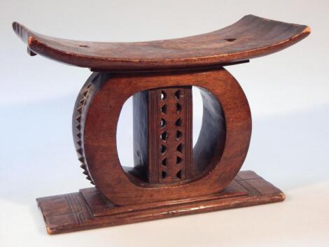 An early 20thC African hardwood headrest