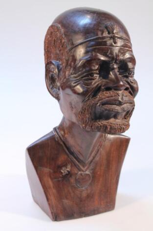 An early 20thC African tribal carved wood head