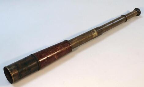 An early 20thC brass and leather four draw telescope, by R & J Beck, London, with cylindrical body, no. 13718, when open 81cm high.