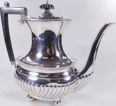 An Edwardian silver coffee pot