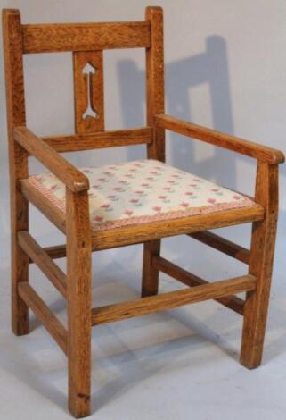 A 20thC oak child's or doll's chair