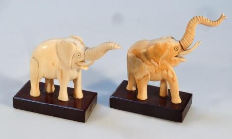 A matched pair of early 20thC ivory figures of elephants