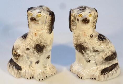 A pair of 19thC Staffordshire spaniels