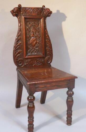 A late 19thC oak hall chair