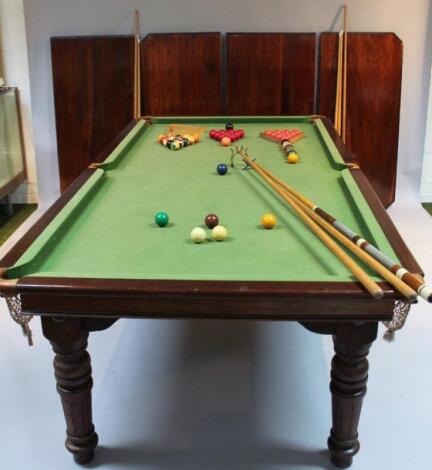 An early 20thC mahogany Riley snooker table come dining table